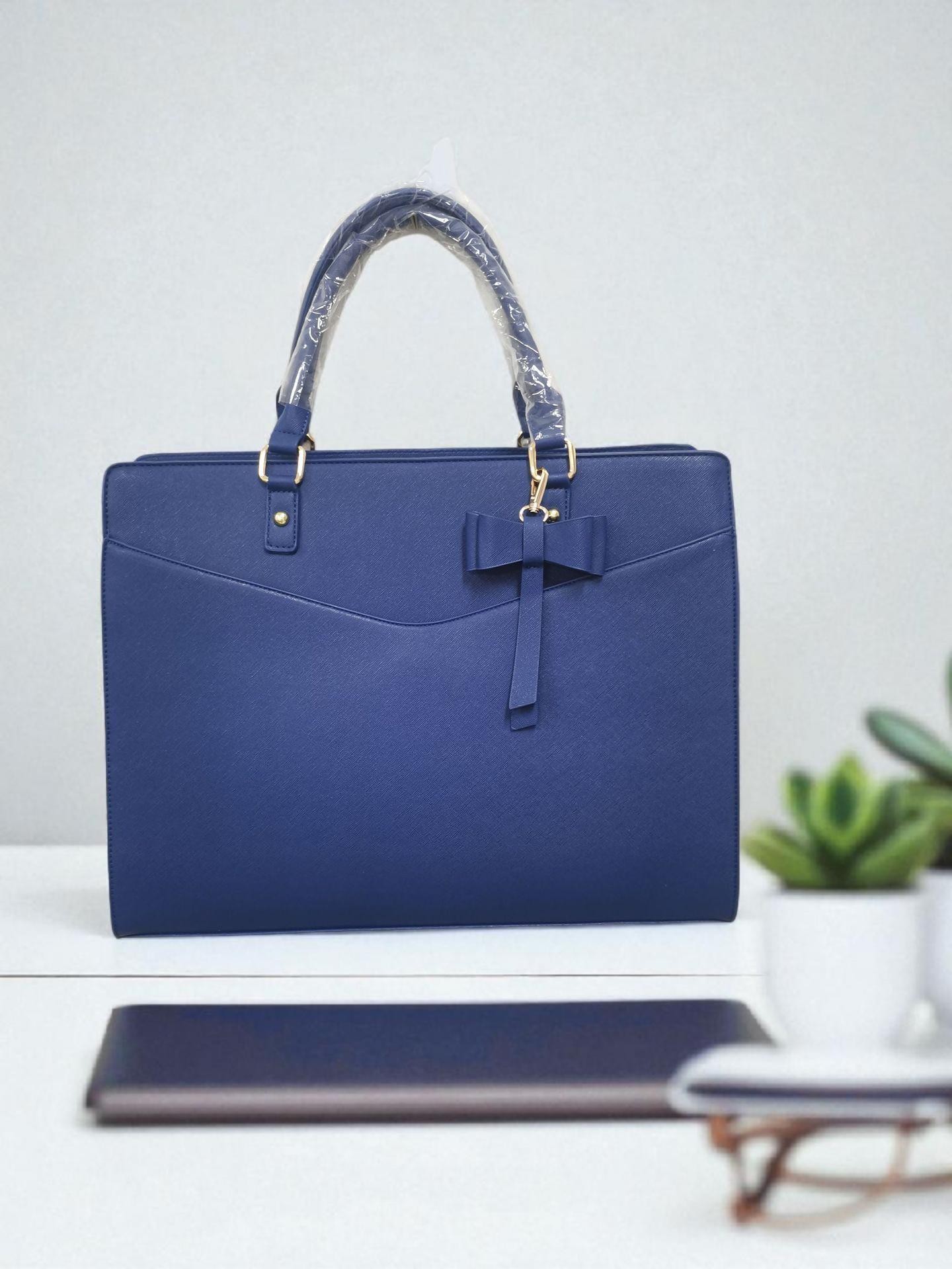 حقيبة يد بتصميم عقدة أنيقة للمناسبات الرسمية