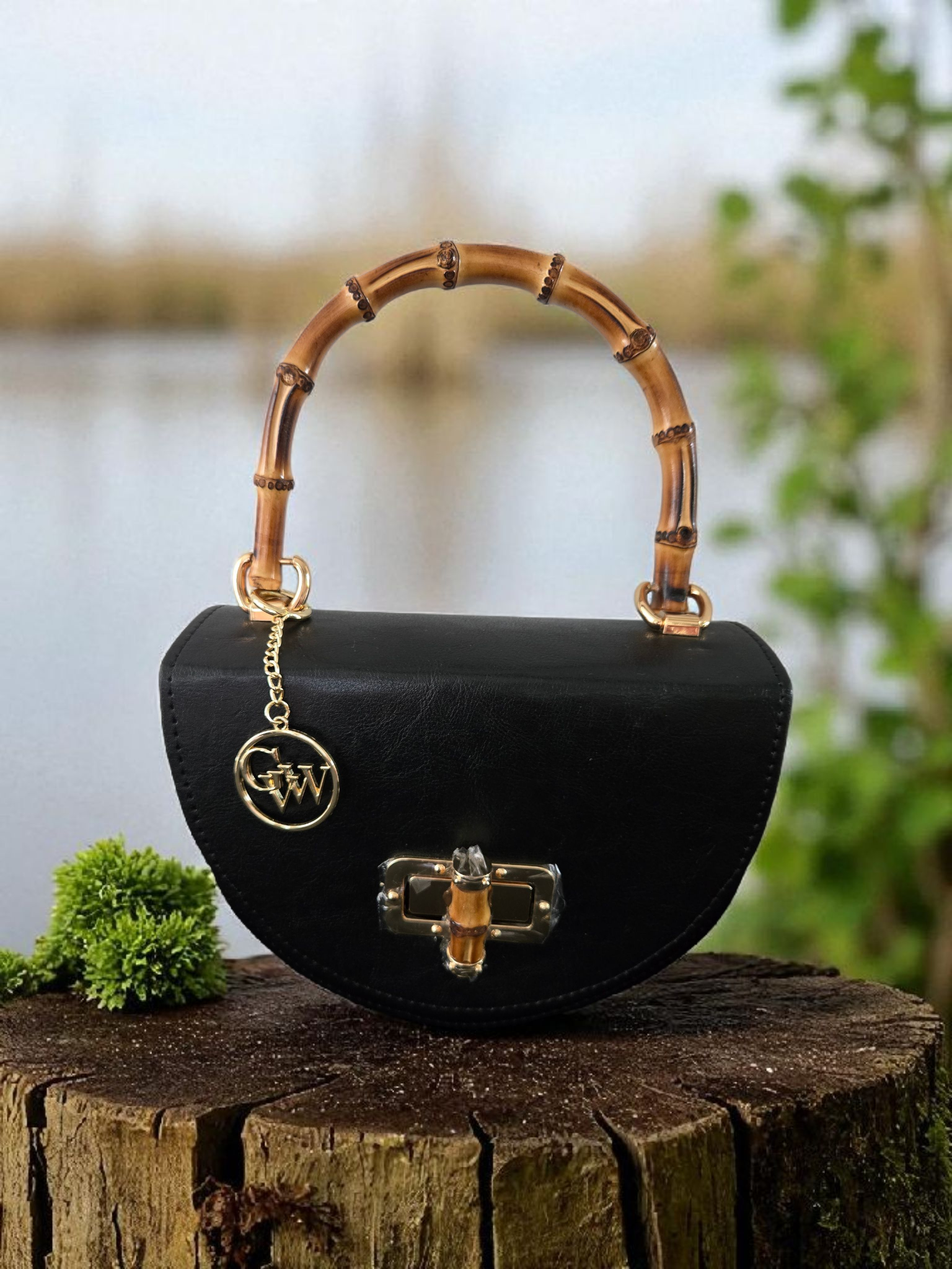 Bolso de mano de cuero elegante con asa de bambú negro y forma de media luna – Gidi Vibes Woman