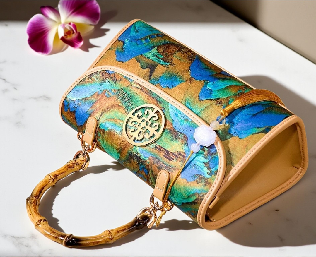 Luxury Bamboo Handle Handbag with Tassel – Artistic Landscape Print